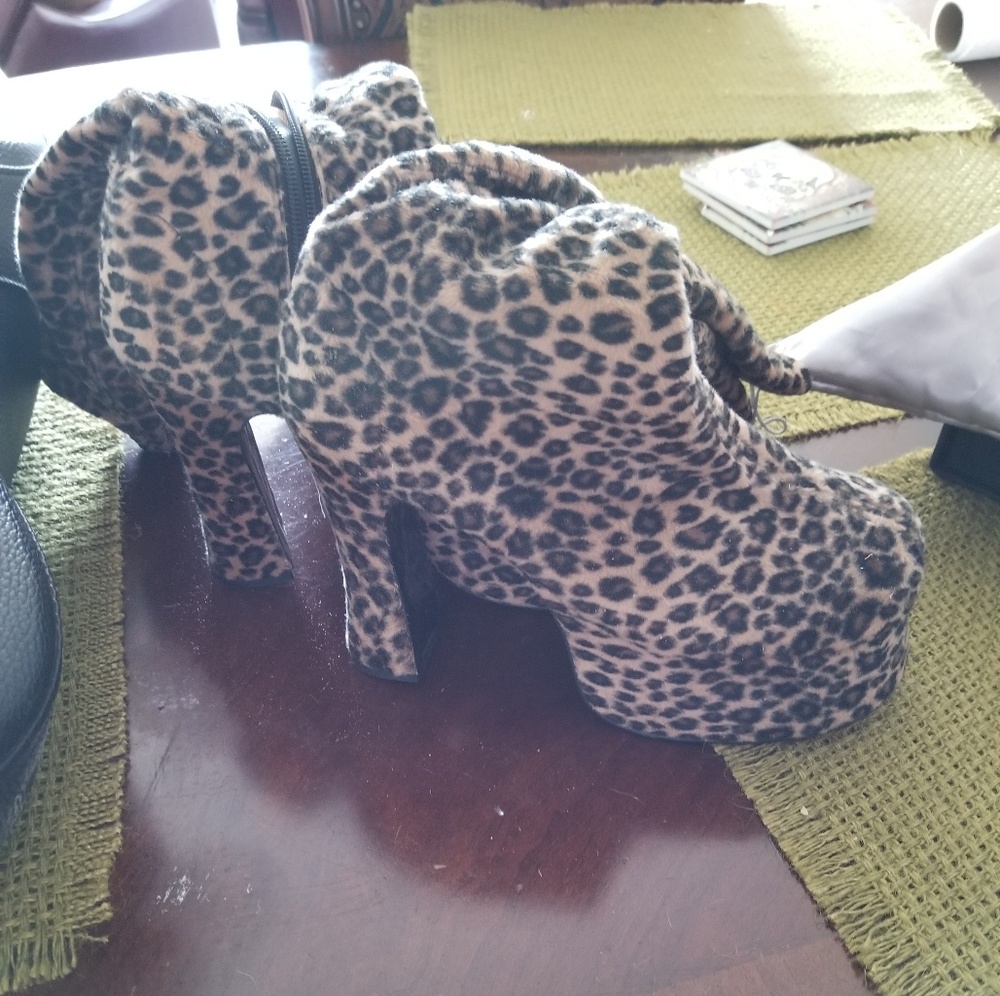 Knee High Cheatah print platform boots